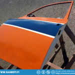 Driver side door with the full color treatment - blue, white, and orange.